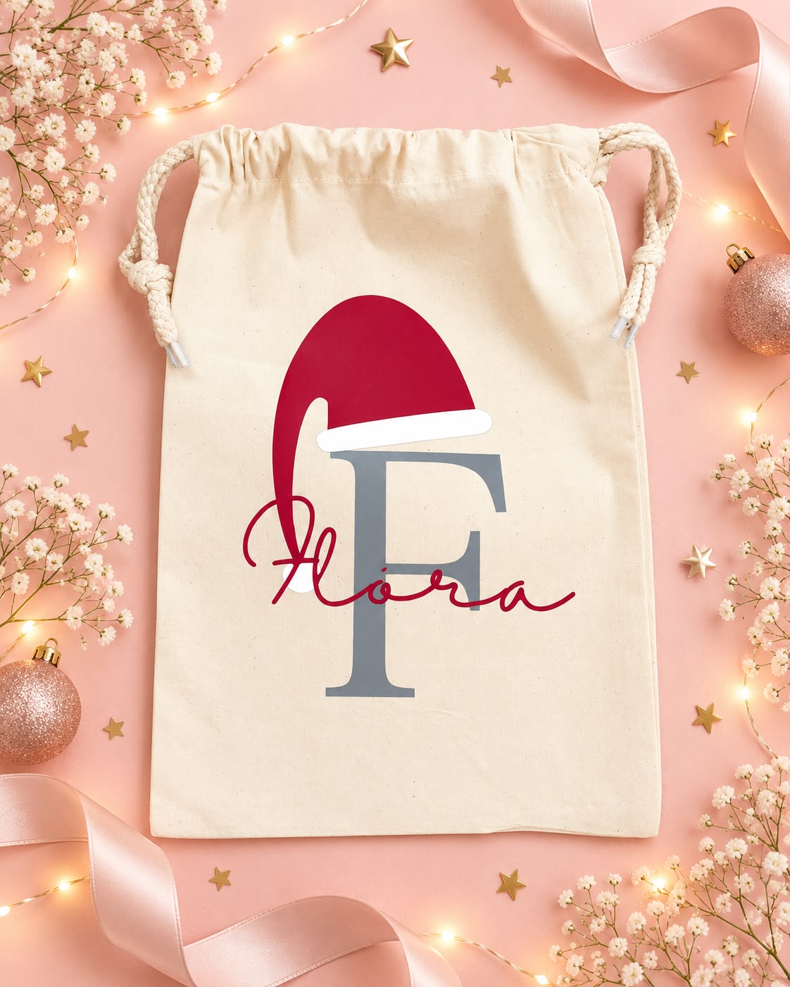 Bolsa navideña natural 20 × 30 cm con inicial y nombre · referencia de personalización Thofanie